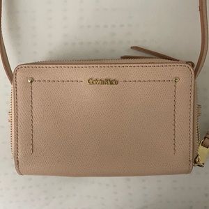 Used a couple of times tan Calvin klein